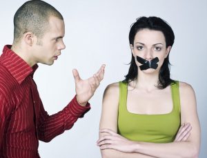 young couple conflict on isolated background